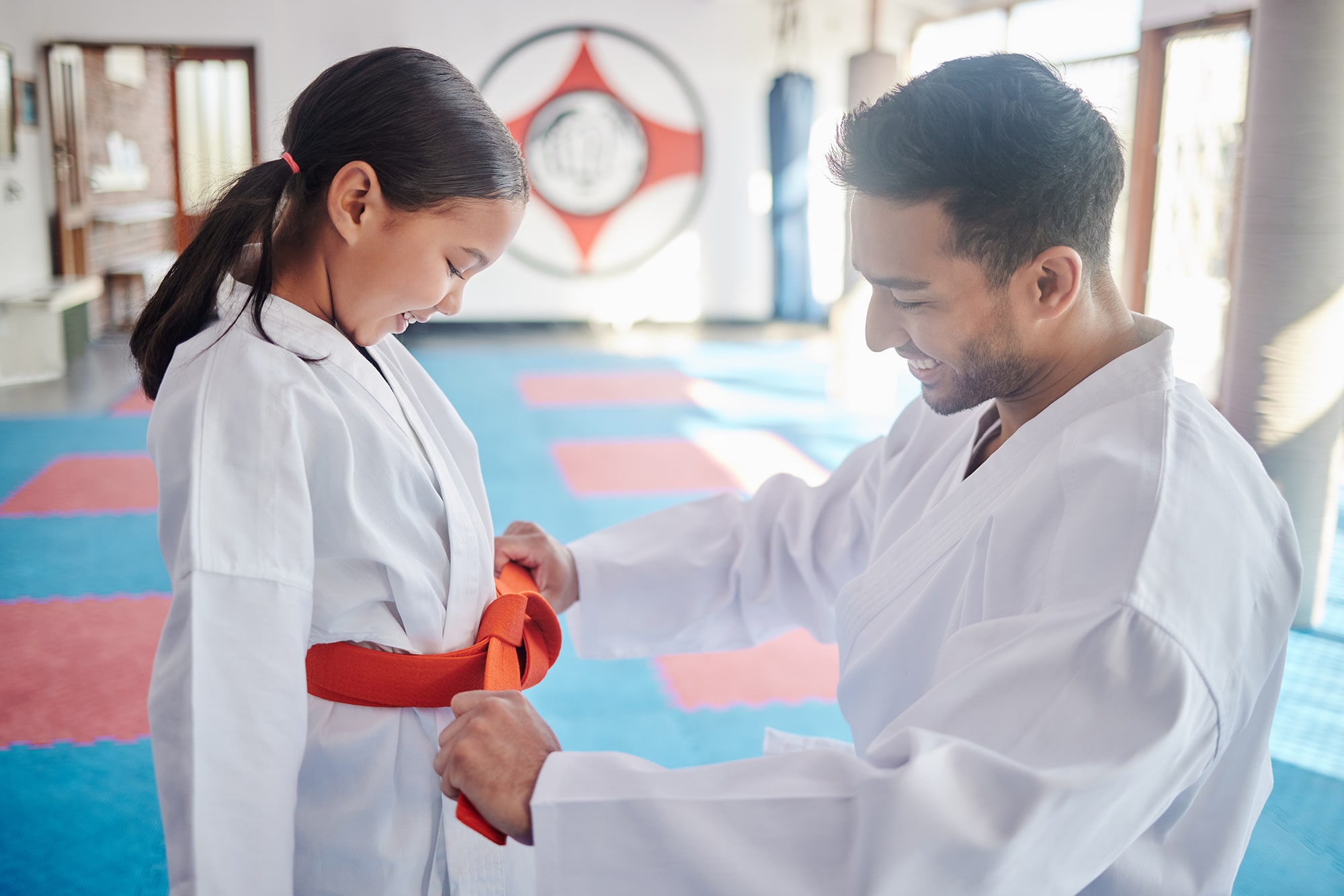 Coach explaining a technique to a student